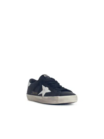 Golden Goose 'super-star' Black Low Top Sneakers With Logo Patch And Suede Details In Leather Man In Black