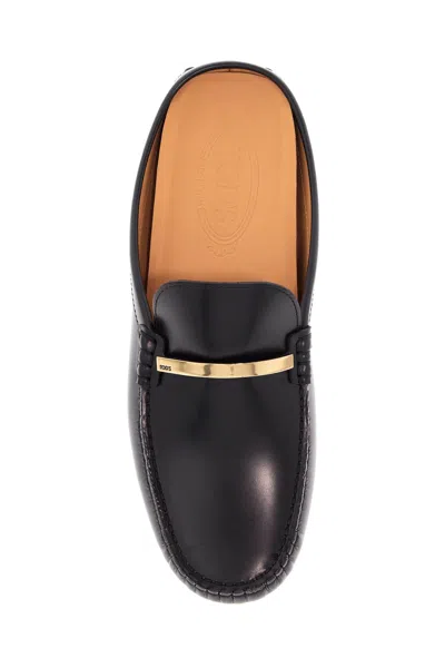 Tod's Black Calfskin Slip-on Loafers With Metallic Strap And Rubber Sole Women