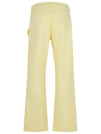 Jw Anderson Cotton Trousers With Wide Twisted Leg In Yellow