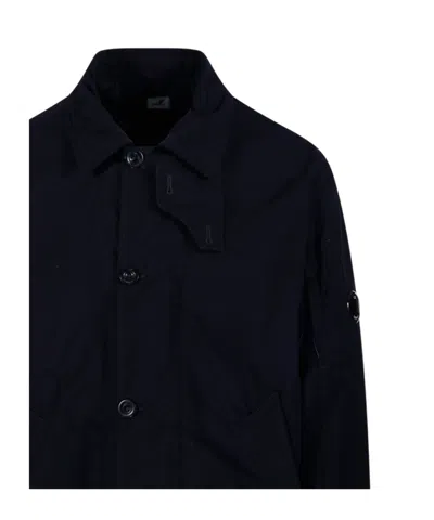 C.p. Company Button-up Minimalist Coat With Adjustable Cuffs And Drawstring Hem In Black