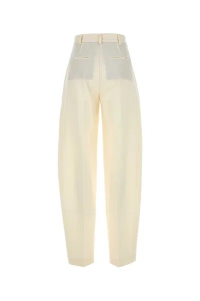 The Andamane Gabardine Trousers With Back Pockets And Pleated Design