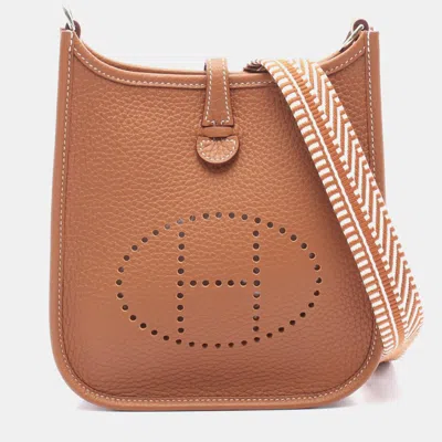 Pre-owned Hermes Evelyne Tpm Gold K Taurillon Clemence Crossbody Bag In Brown