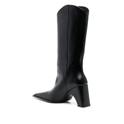 Coperni Leather Boots With Iconic Logo In Black