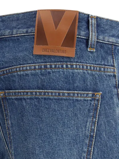 Valentino Heart Court Straight Jeans With Embroidered Hem In Blue