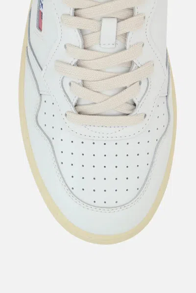 Autry Low-top Sneakers With Perforated Detailing And Rubber Sole In White