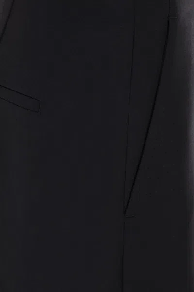 Givenchy Wool Bootcut Tailored Trousers In Black