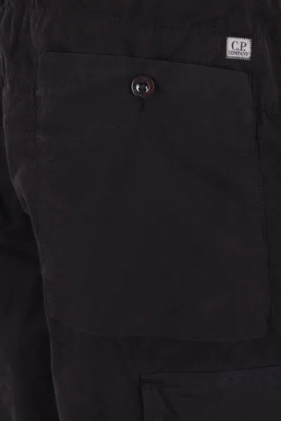 C.p. Company Lens-detail Cargo Pants In Black