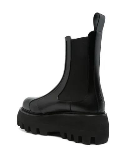 Alexander Mcqueen Black Glossy Leather Ankle Boots With Tank Sole