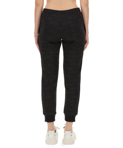Moschino Cotton Joggers With Ribbed Elastic Waist In Black
