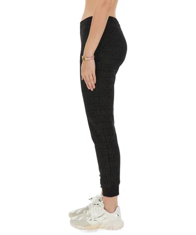 Moschino Cotton Joggers With Ribbed Elastic Waist In Black