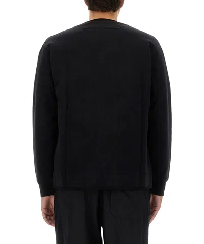 C.p. Company Zip Sweatshirt With Button And Patchwork In Black