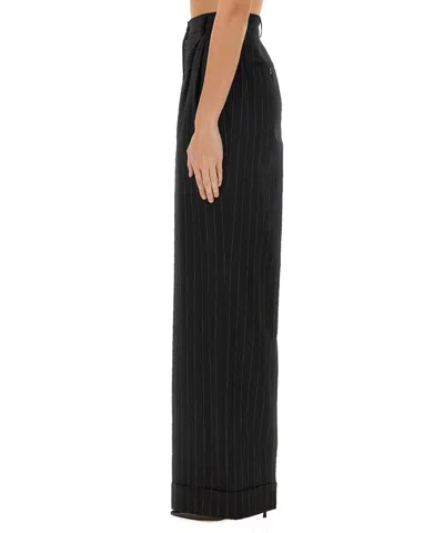 Dolce & Gabbana Flared Wool Pants In Black