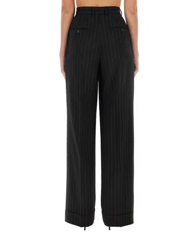 Dolce & Gabbana Flared Wool Pants In Black