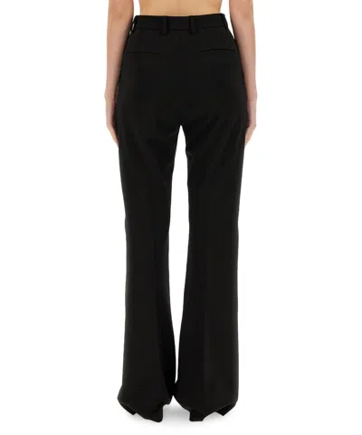 Dolce & Gabbana Flare Leg Trousers With Pockets And Belt Loops In Black