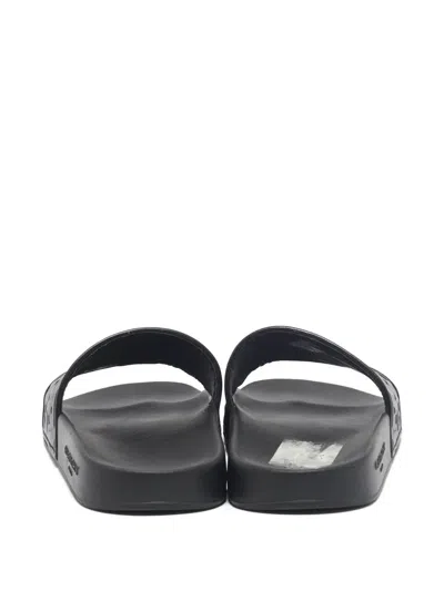 Pre-owned Givenchy Embossed Leather Slides In Black