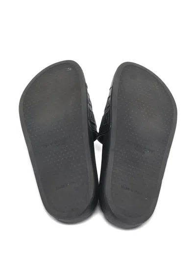 Pre-owned Givenchy Embossed Leather Slides In Black
