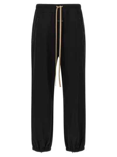 Fear Of God Elastic Waistband Trackpant Joggers With Side Zip Pockets In Black