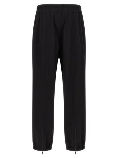 Fear Of God Elastic Waistband Trackpant Joggers With Side Zip Pockets In Black