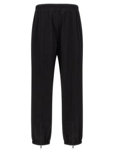 Fear Of God Elastic Waistband Trackpant Joggers With Side Zip Pockets In Black