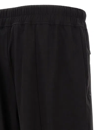 Fear Of God Elastic Waistband Trackpant Joggers With Side Zip Pockets In Black