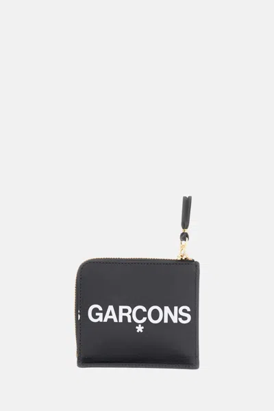 Comme Des Garçons Play Wallets