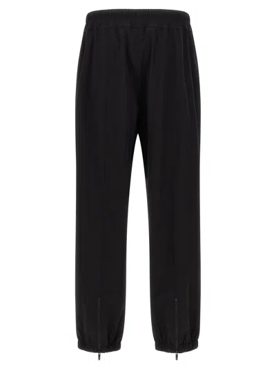 Fear Of God Elastic Waistband Trackpant Joggers With Side Zip Pockets In Black