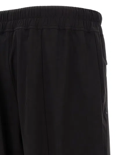 Fear Of God Elastic Waistband Trackpant Joggers With Side Zip Pockets In Black