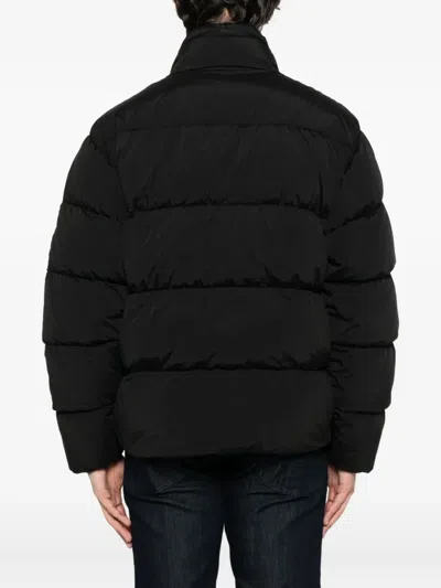 C.p. Company Puffy Orange Jacket With High Collar In Black