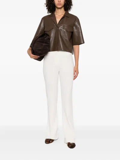 Nanushka Shera Back-slit Trousers In Neutral