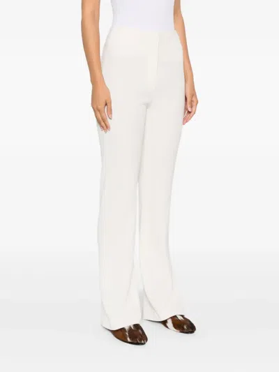 Nanushka Shera Back-slit Trousers In Neutral