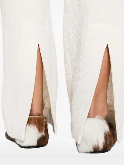 Nanushka Shera Back-slit Trousers In Neutral