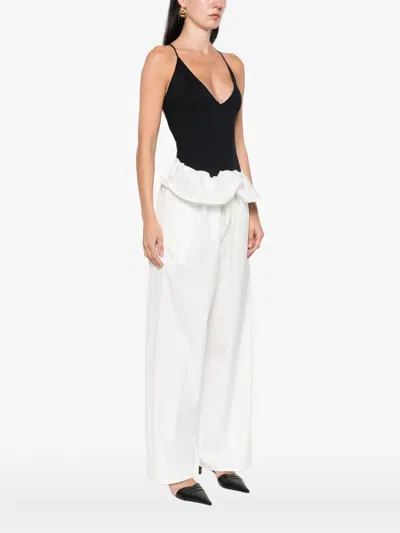 Wardrobe.nyc V-neck Bodysuit In Black