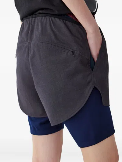 Studio Tomboy Layered Pocketed Knee-length Shorts