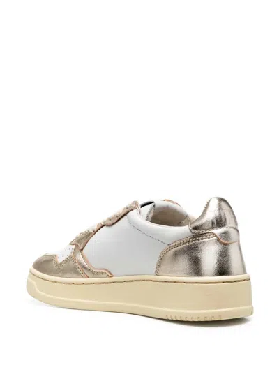 Autry Medalist Low Two-tone White Leather And Platinum Metallic Sneakers In Gold