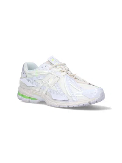 New Balance Low Top Sneakers With Mesh Panels And Reflective Accents In Multi