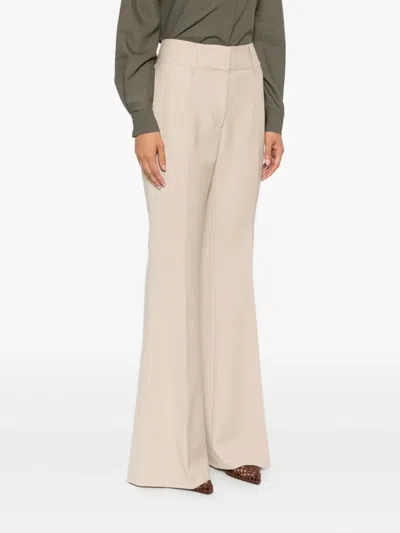 Gabriela Hearst Pleated Flared Trousers In Neutral