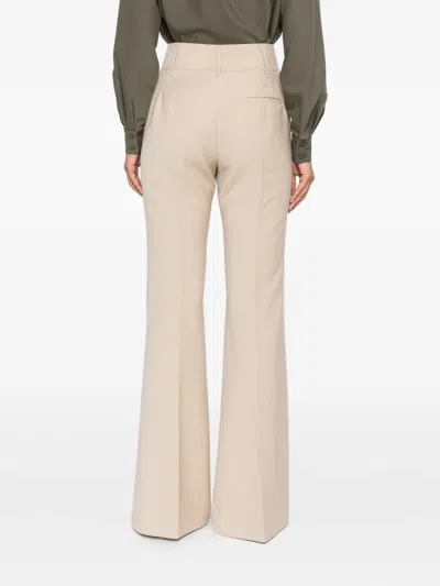 Gabriela Hearst Pleated Flared Trousers In Neutral