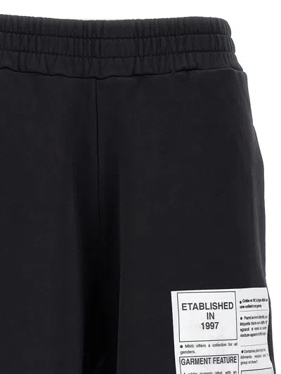 Mm6 Maison Margiela Black Track Pants With Cut-out Details In Blue