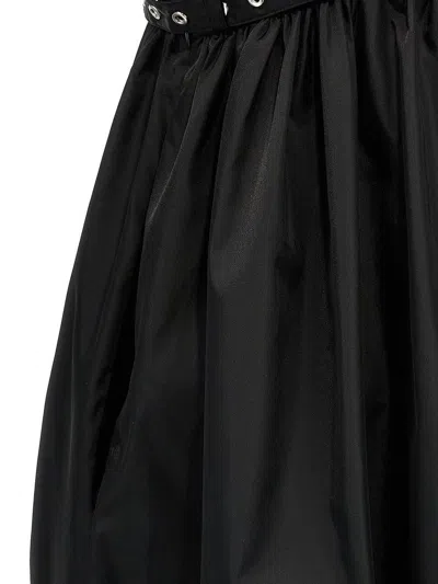 Ganni Black Long Dress With A V-neck Embellished With Studs In Black