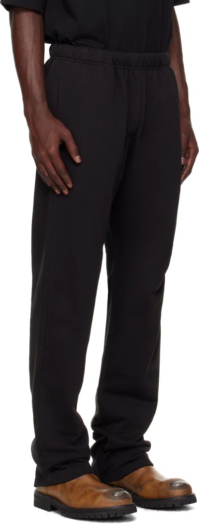 We11 Done Back Logo Wide Jogger Pants In Black