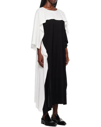 Issey Miyake Hit The Color Of A Medium-length Dress In Black