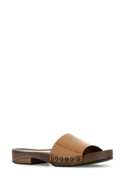 Miu Miu Flat Sole Studded Open Toe Clogs In Brown
