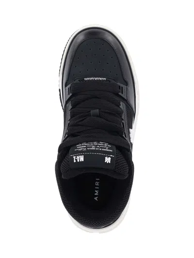Amiri Black Low Top Sneakers With Logo Patch On The Tongue And Logo Lettering On The Heel In Leather Man