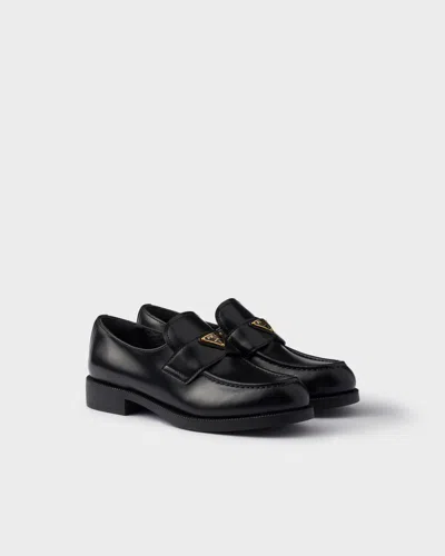 Prada Leather Loafers With Round Toe And Decorative Buckle In Black