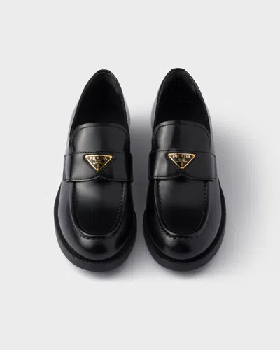 Prada Leather Loafers With Round Toe And Decorative Buckle In Black
