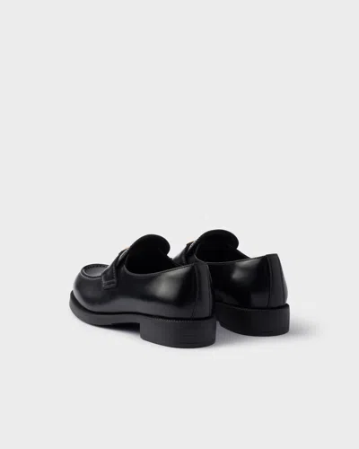 Prada Leather Loafers With Round Toe And Decorative Buckle In Black