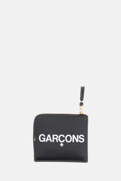 Comme Des Garçons Play Wallets