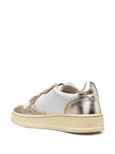 Autry Medalist Low Two-tone White Leather And Platinum Metallic Sneakers In Gold