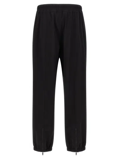 Fear Of God Elastic Waistband Trackpant Joggers With Side Zip Pockets In Black
