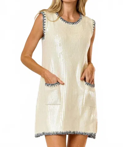 Lalavon Sequin Contrast Stitch Front Pocket Mini Dress In Cream
